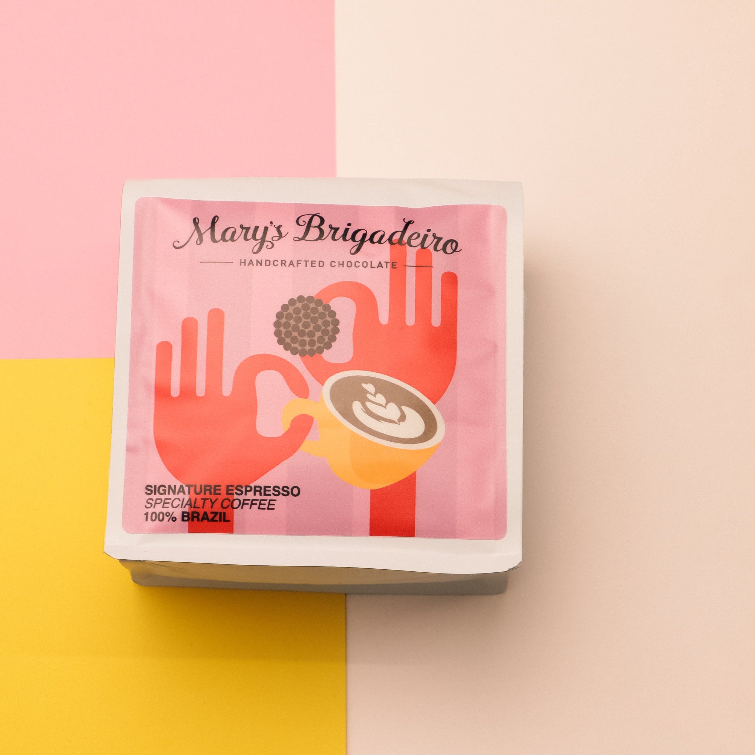 Coffee packaging with a colorful geometric background